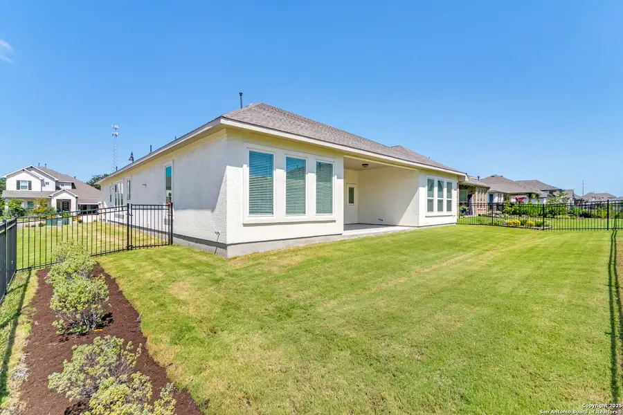 Front exterior of a new home in Esperanza 60', Boerne, TX, highlighting curb appeal (Image 2). Front exterior of a new home in Esperanza 60', Boerne, TX, highlighting curb appeal (Image 2).