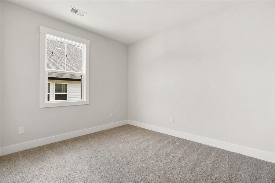Comfortable carpeted flooring awaits in this natur Comfortable carpeted flooring awaits in this natur