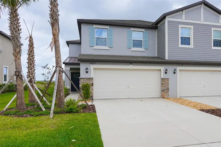 Front exterior of a new home in , San Antonio, FL, highlighting curb appeal (Image 24).