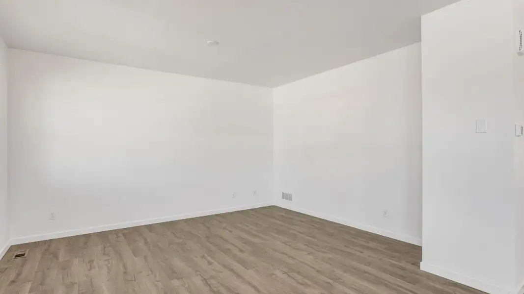 Spacious, unfurnished interior of a new home in Sky Ranch, Watkins (Image 12).