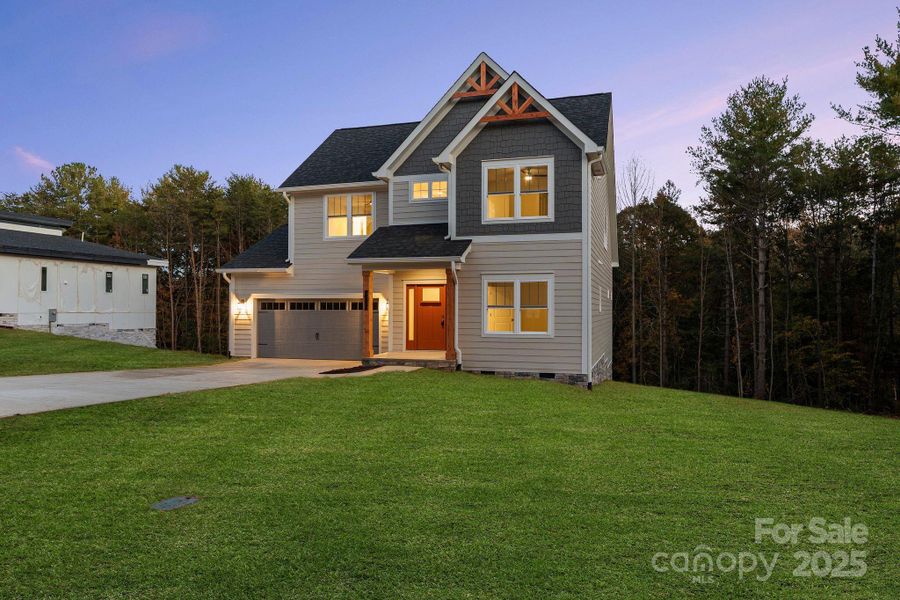 Front exterior of a new home in , Hickory, NC, highlighting curb appeal (Image 2).