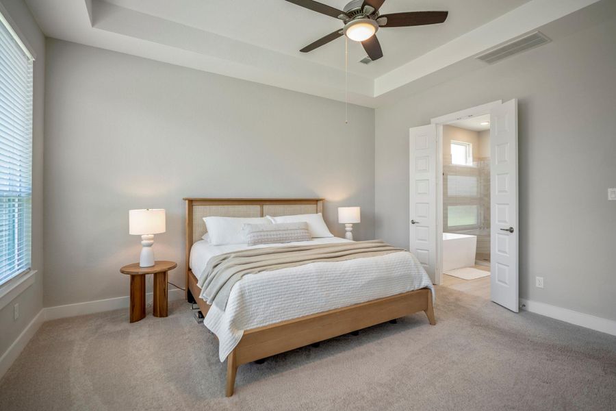 Complete with a massive walk-in closet and spa-inspired ensuite bathroom, this spacious owner’s retreat offers a peaceful stylish space to begin and end each day.