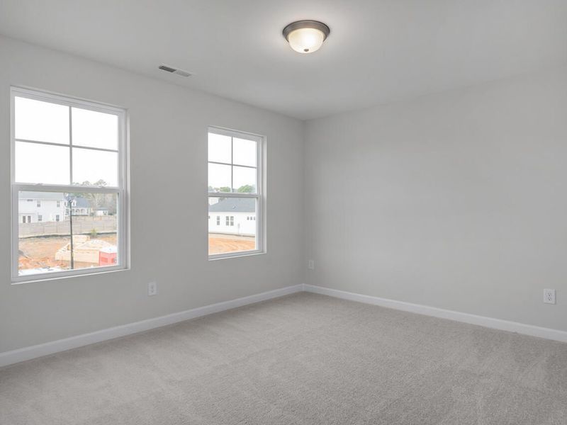 Spacious, unfurnished interior of a new home in Gregory Village, Lillington (Image 20). Spacious, unfurnished interior of a new home in Gregory Village, Lillington (Image 20).