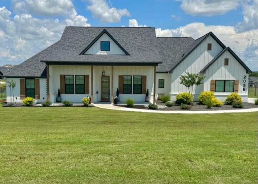 Front exterior of a new home in , Weatherford, TX, highlighting curb appeal (Image 1). Front exterior of a new home in , Weatherford, TX, highlighting curb appeal (Image 1).