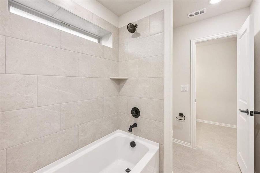 Furnished interior view inside a new home in Villages of Hurricane Creek, Anna (Image 14).