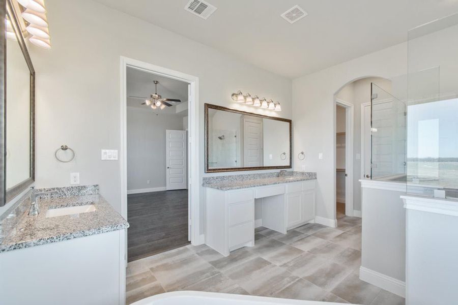 Primary Bathroom | Concept 2915 at The Meadows in Gunter, TX by Landsea Homes