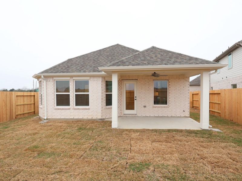 Exterior details and patio area of a home in Wildrye, Waller (Image 4).