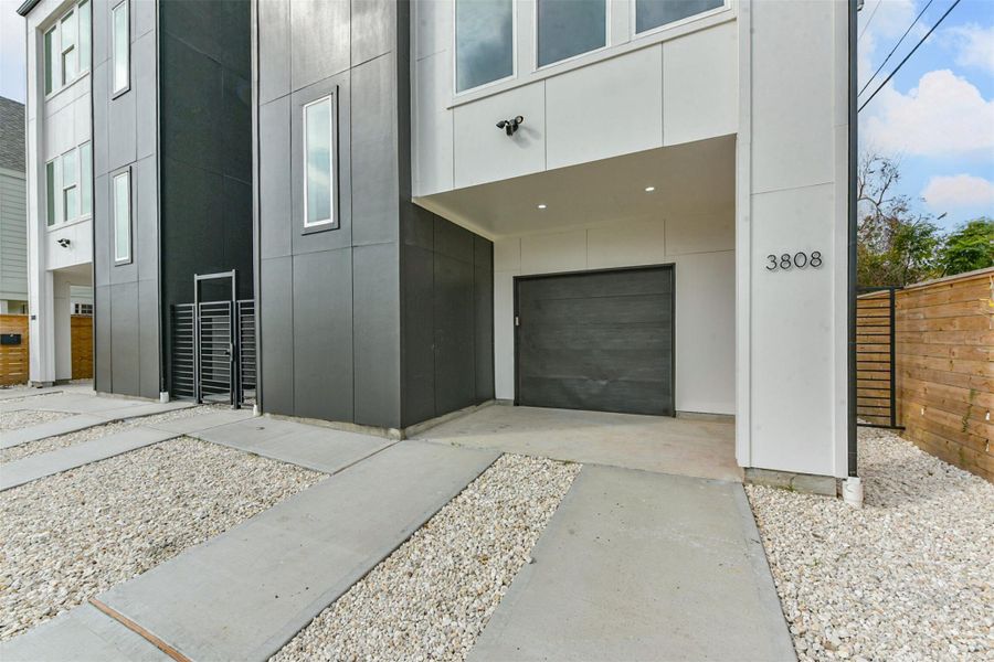 Driveway parking. 3810 driveway and garage are mirrored.