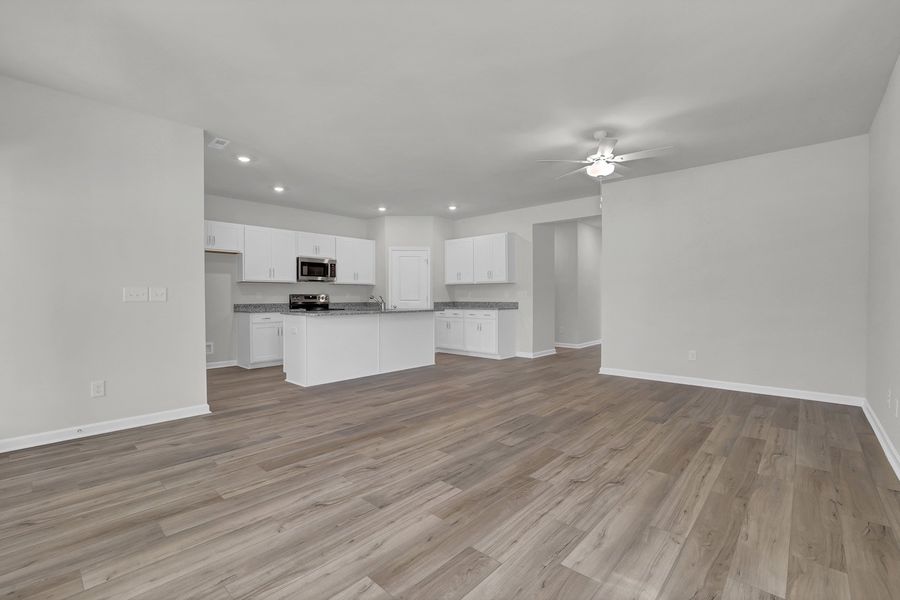 Spacious, unfurnished interior of a new home in River Tide Farms, Bolivia (Image 14).