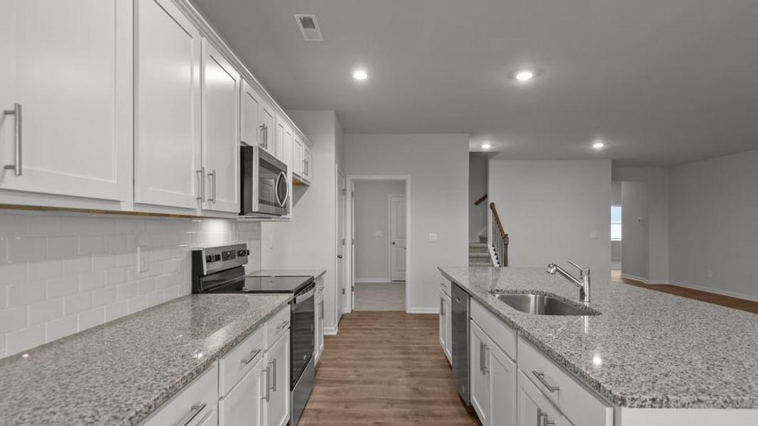 Furnished interior view inside a new home in East Ridge, Ayden (Image 8).