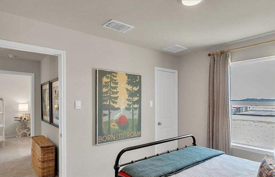 Bedroom featuring baseboards Bedroom featuring baseboards