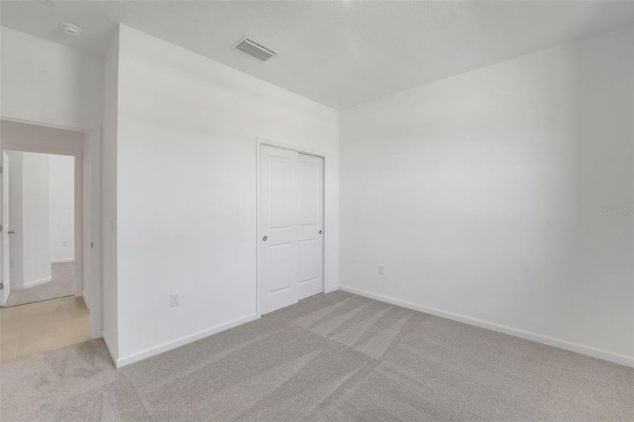 Spacious, unfurnished interior of a new home in Willowbrook North, Winter Haven (Image 28).