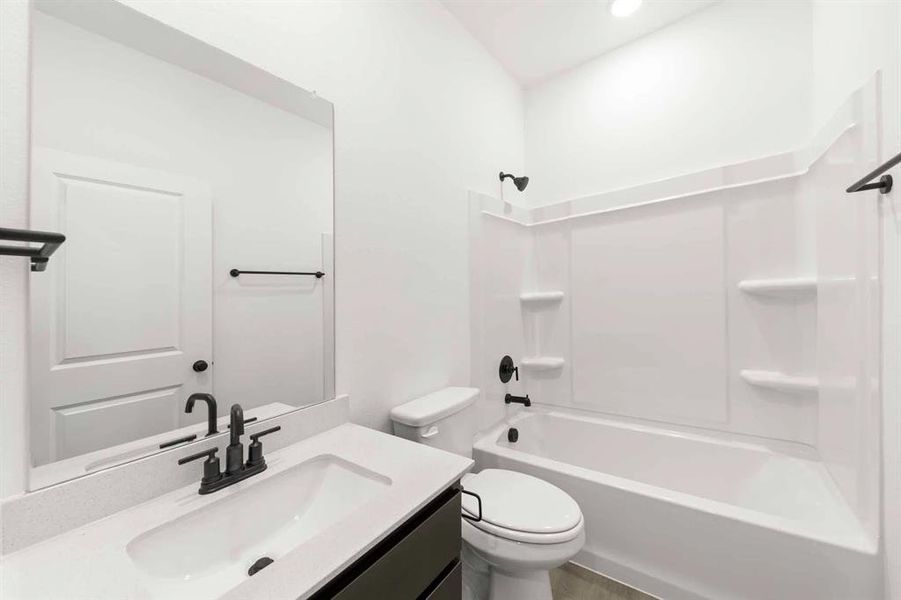 Furnished interior view inside a new home in Creekview Fossil Ridge, Pilot Point (Image 12).