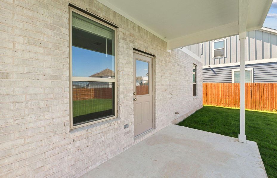 Exterior details and patio area of a home in Santa Rita Ranch, Liberty Hill (Image 21). Exterior details and patio area of a home in Santa Rita Ranch, Liberty Hill (Image 21).