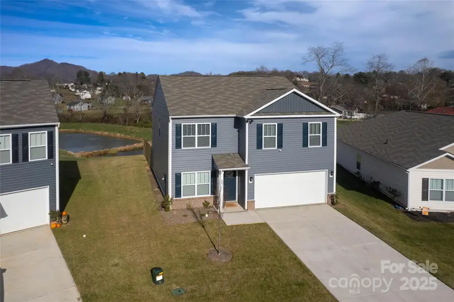 Front exterior of a new home in , Clyde, NC, highlighting curb appeal (Image 1). Front exterior of a new home in , Clyde, NC, highlighting curb appeal (Image 1).