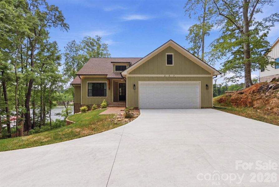 Front exterior of a new home in , Lexington, NC, highlighting curb appeal (Image 24).