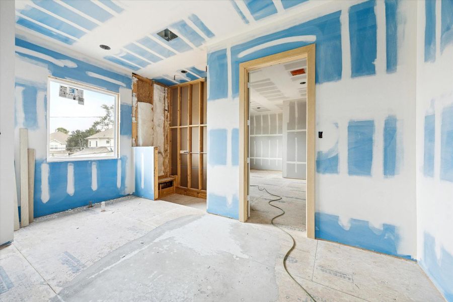 Spa like primary bathroom offers a well balanced layout with two sinks for everyday ease, a dedicated soaking tub positioned for relaxation, and a separate walk in shower. Generous proportions allow for high end finishes and a calm, private atmosphere that elevates the primary suite experience.