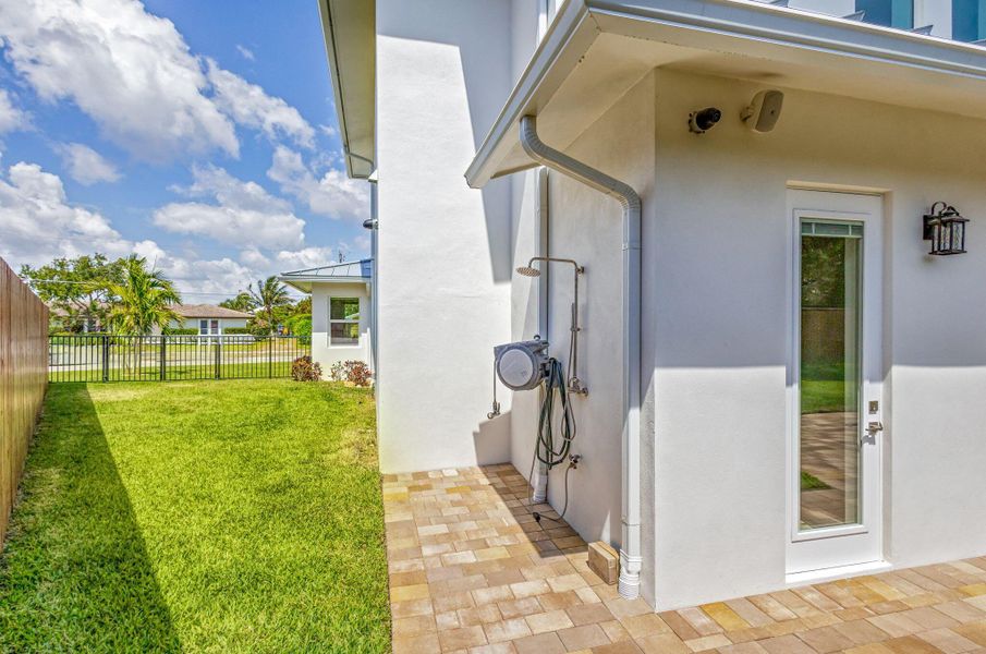 Front exterior of a new home in , North Palm Beach, FL, highlighting curb appeal (Image 22). Front exterior of a new home in , North Palm Beach, FL, highlighting curb appeal (Image 22).