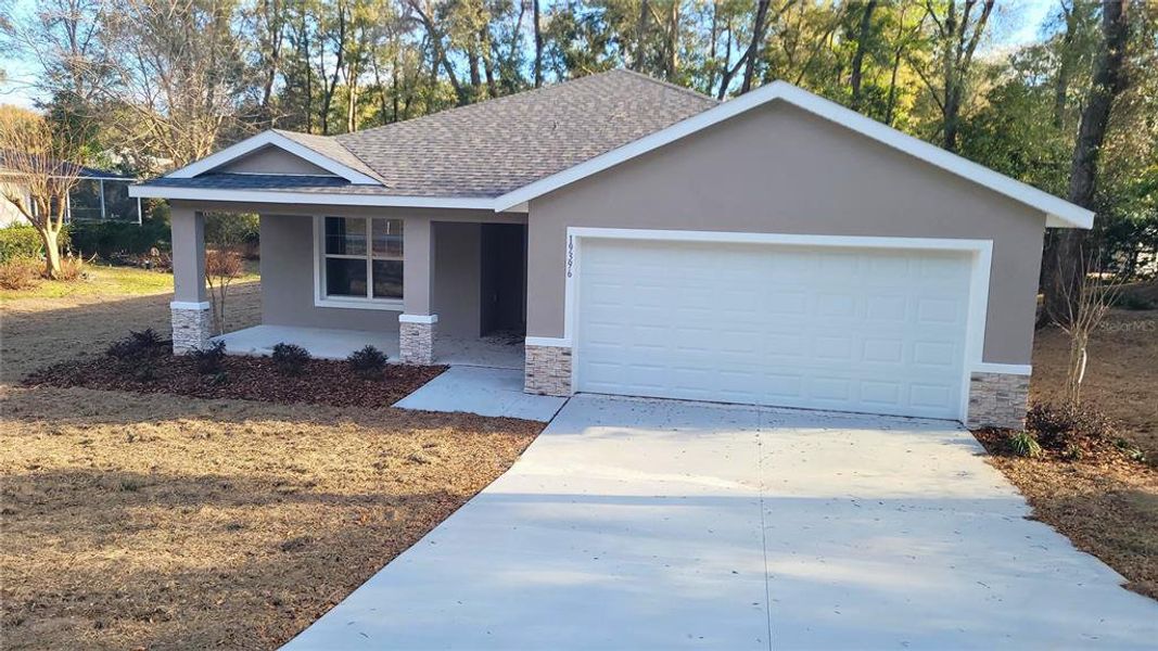 Front exterior of a new home in , Dunnellon, FL, highlighting curb appeal (Image 2). Front exterior of a new home in , Dunnellon, FL, highlighting curb appeal (Image 2).
