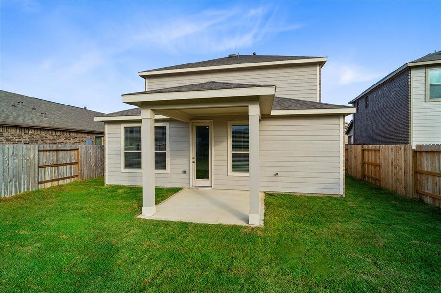 Come and see this spacious backyard with covered patio. There is plenty of room for the kids to play and adults to relax!