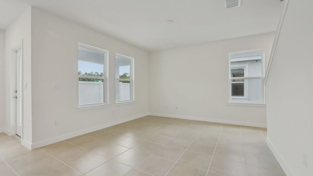 Living Area of the Coronado - End at Cyrene at Harmony located in St Cloud FL by DRB Homes Living Area of the Coronado - End at Cyrene at Harmony located in St Cloud FL by DRB Homes