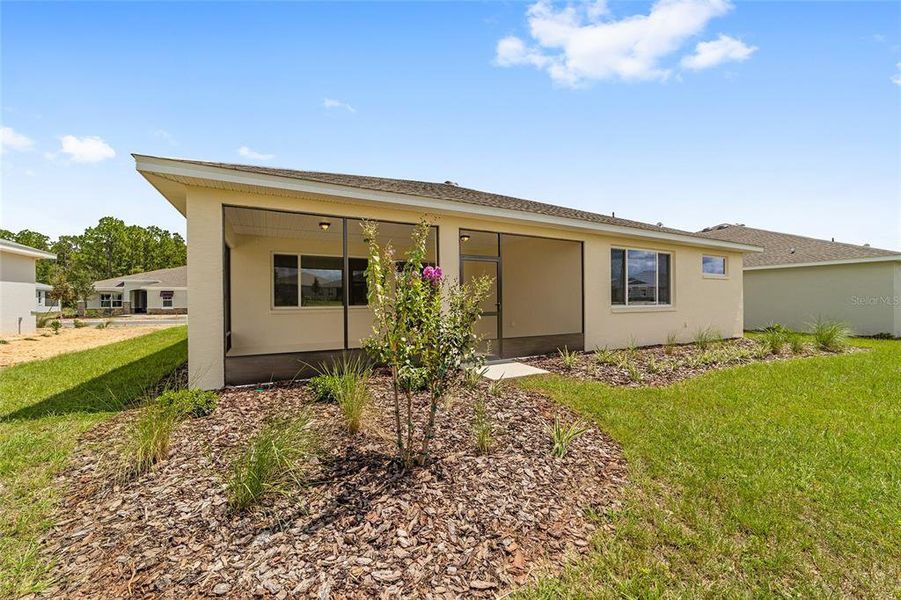 Front exterior of a new home in On Top of the World Communities, Ocala, FL, highlighting curb appeal (Image 13).