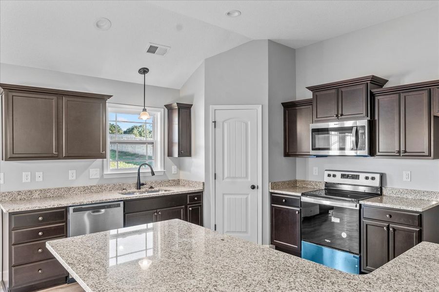 Representative furnished interior of a home built from the Whitney by Enchanted Homes in Ballentine Ridge, Lyman (Image 10).
