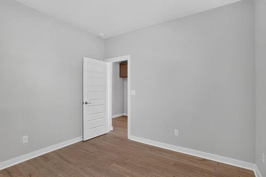 Spacious, unfurnished interior of a new home in The Cottages at East Lanier, Fayetteville (Image 15).