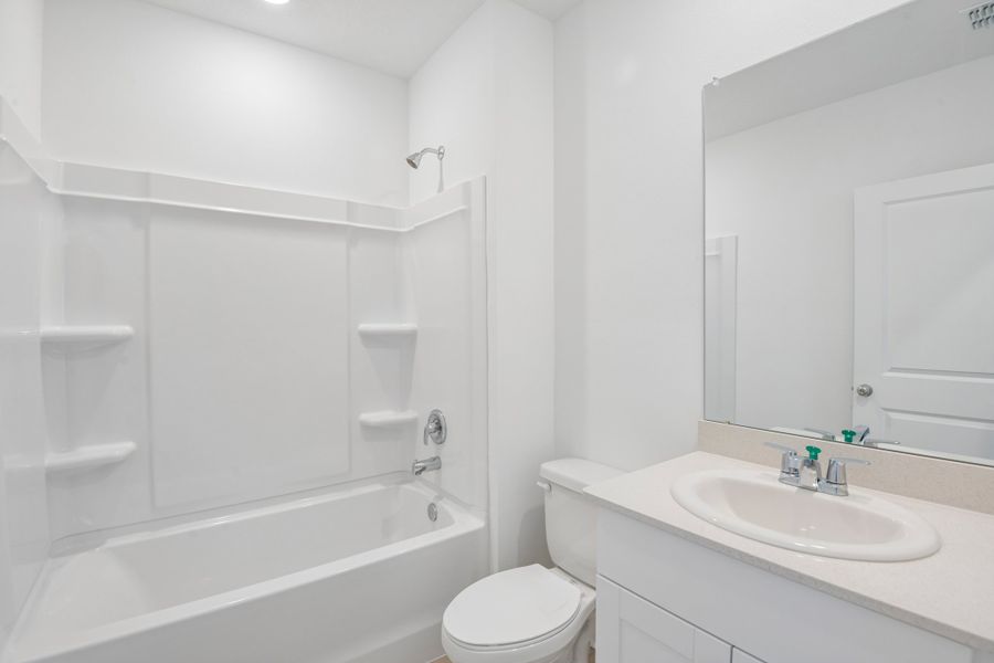 Representative furnished interior of a home built from the Blackbird by Taylor Morrison in Westview Community Group Page, Kissimmee (Image 7).