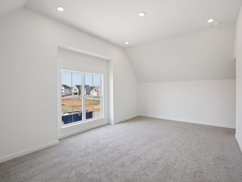 The primary suite offers a private retreat.