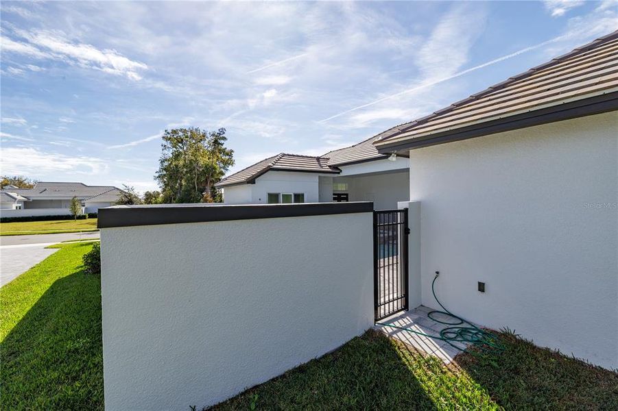 Exterior details and patio area of a home in Toscana, Palm Coast (Image 28).