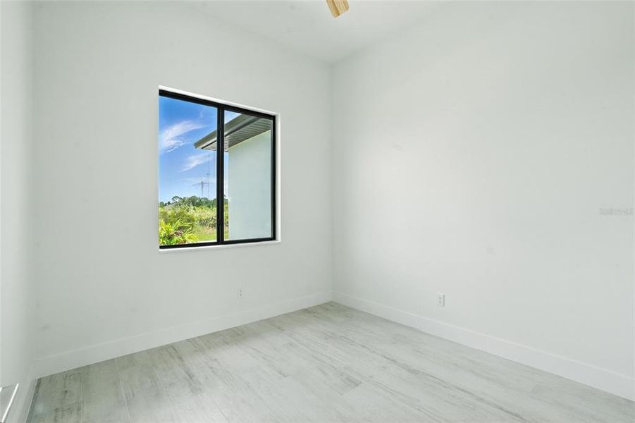 Spacious, unfurnished interior of a new home in , Port Charlotte (Image 46).