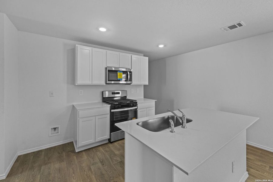Furnished interior view inside a new home in Hickory Ridge, Elmendorf (Image 12).