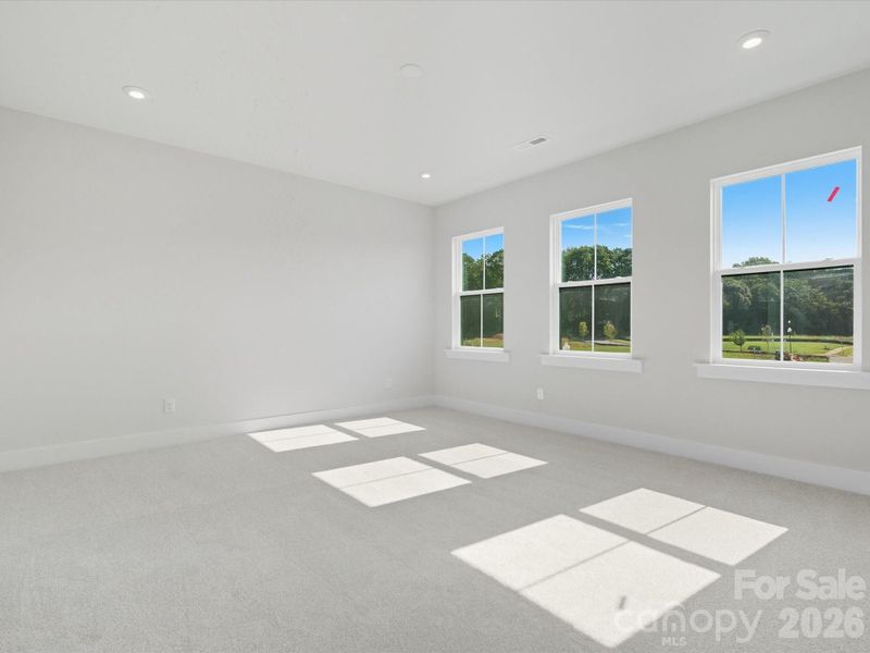 Light filled primary bedroom