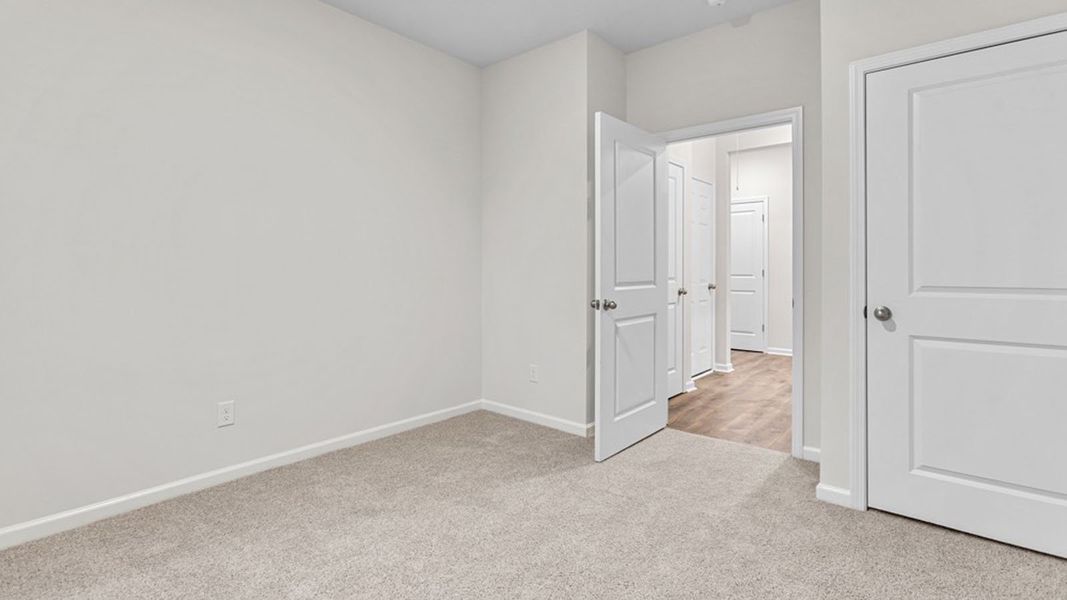 Spacious, unfurnished interior of a new home in The Landing at Summerhaven, Mebane (Image 18).