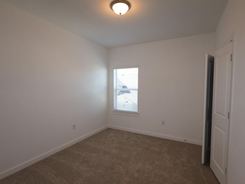 Spacious, unfurnished interior of a new home in Cedar Brook, Leander (Image 10).