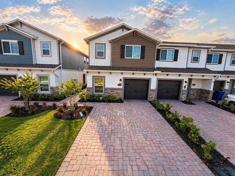 Front exterior of a new home in , St. Cloud, FL, highlighting curb appeal (Image 25).