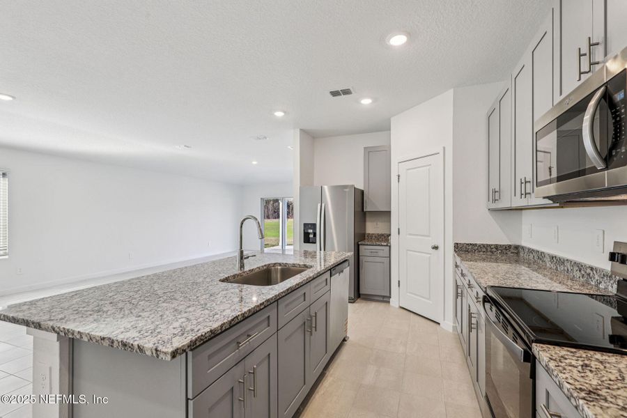 Furnished interior view inside a new home in Azalea Creek, Jacksonville (Image 6).