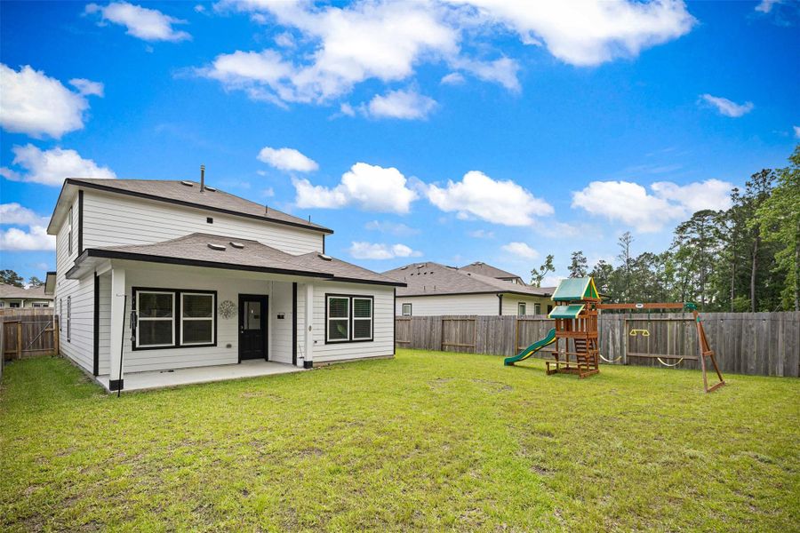 Front exterior of a new home in Liberty Collection at Fairway Farms, Tomball, TX, highlighting curb appeal (Image 16).