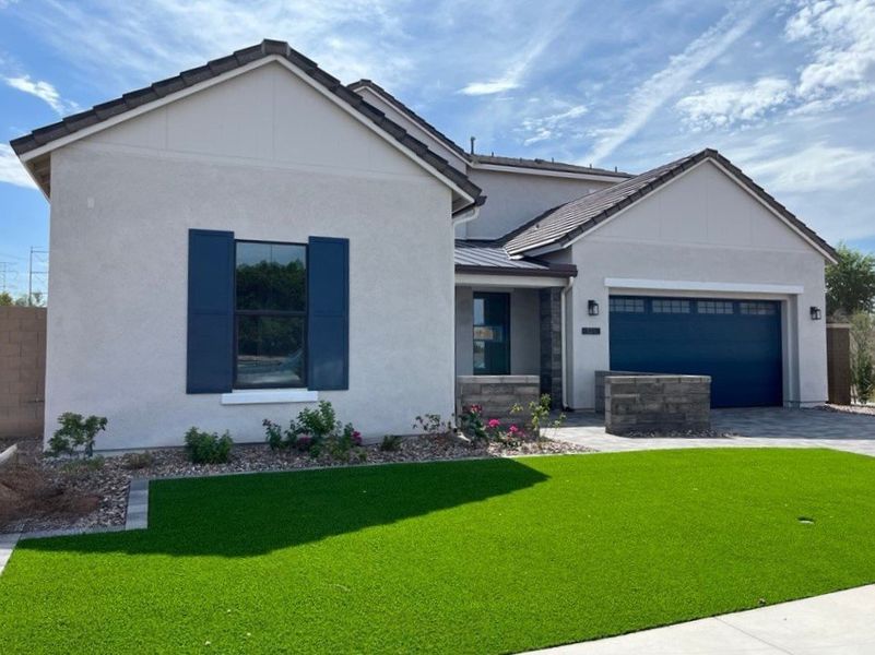 Front exterior of a new home in 33 North, Gilbert, AZ, highlighting curb appeal (Image 11).