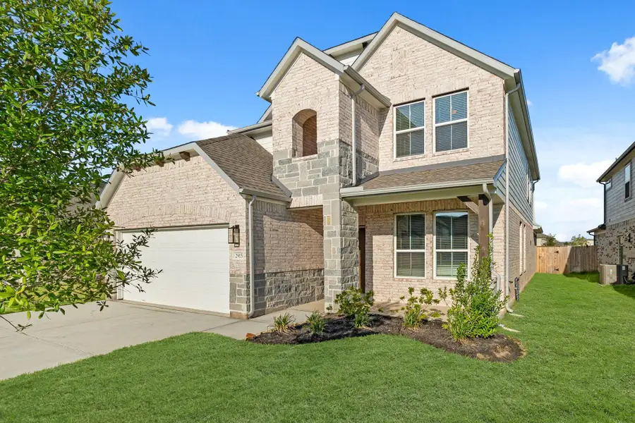 Front exterior of a new home in Morton Creek Ranch, Katy, TX, highlighting curb appeal (Image 1).