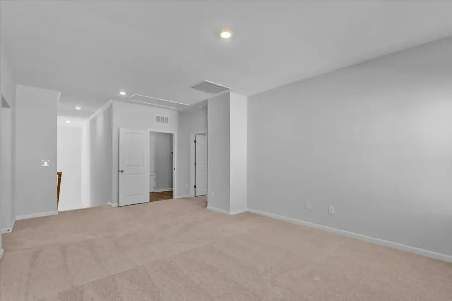 Spacious, unfurnished interior of a new home in Lilah Grove, Summerfield (Image 46).