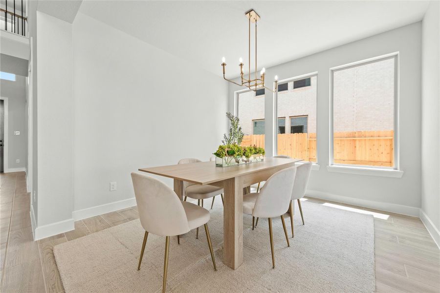 Furnished interior view inside a new home in Sunterra, Katy (Image 3).