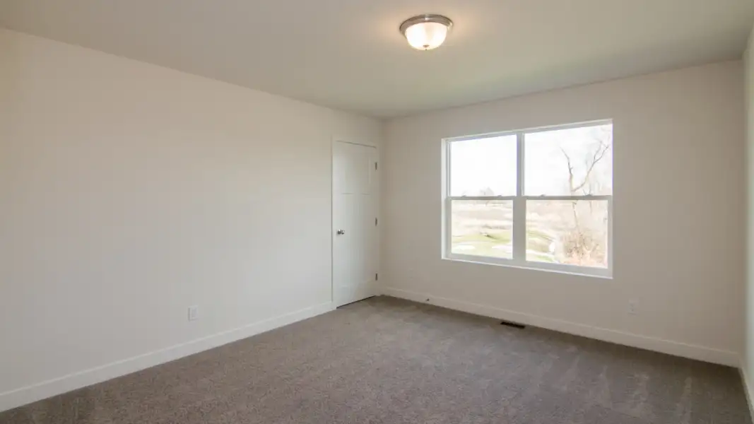 Representative unfurnished interior of a home built from the The Hartland by Norfolk Homes in Offsite Builds Southern Michigan, Ann Arbor (Image 74).