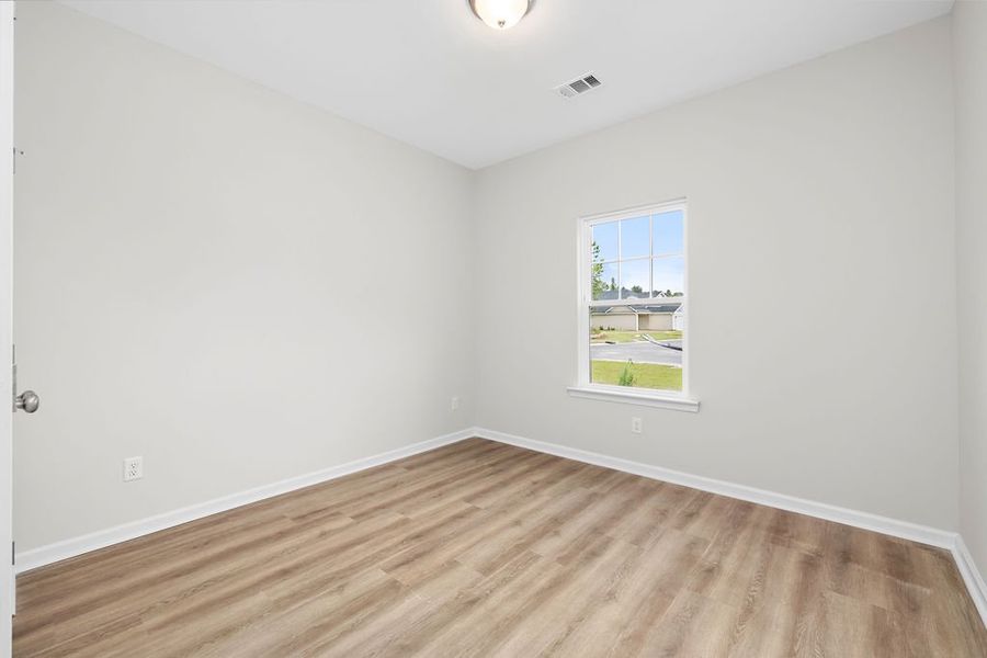 Representative unfurnished interior of a home built from the The Loblolly by Smith Family Homes in Heritage at New Riverside, Bluffton (Image 23).