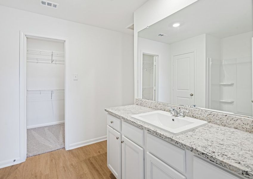 Large granite vanity in the master bathroom