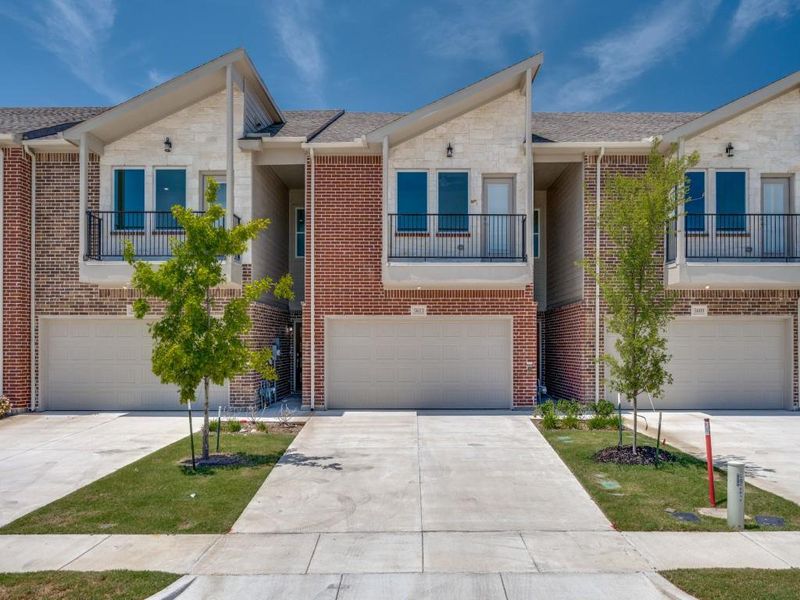 Front exterior of a new home in Brentwood Court, The Colony, TX, highlighting curb appeal (Image 1). Front exterior of a new home in Brentwood Court, The Colony, TX, highlighting curb appeal (Image 1).