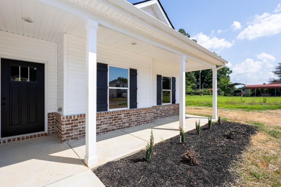 Exterior details and patio area of a home in Woodland Farms, Dickson (Image 3). Exterior details and patio area of a home in Woodland Farms, Dickson (Image 3).