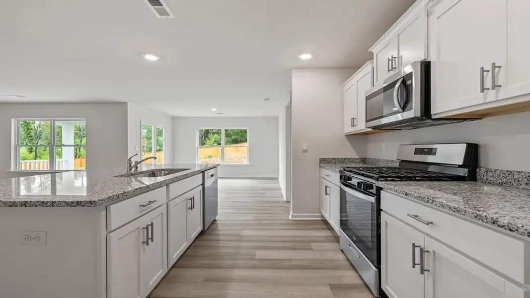 Furnished interior view inside a new home in Bentley Park, Greenwood (Image 9).