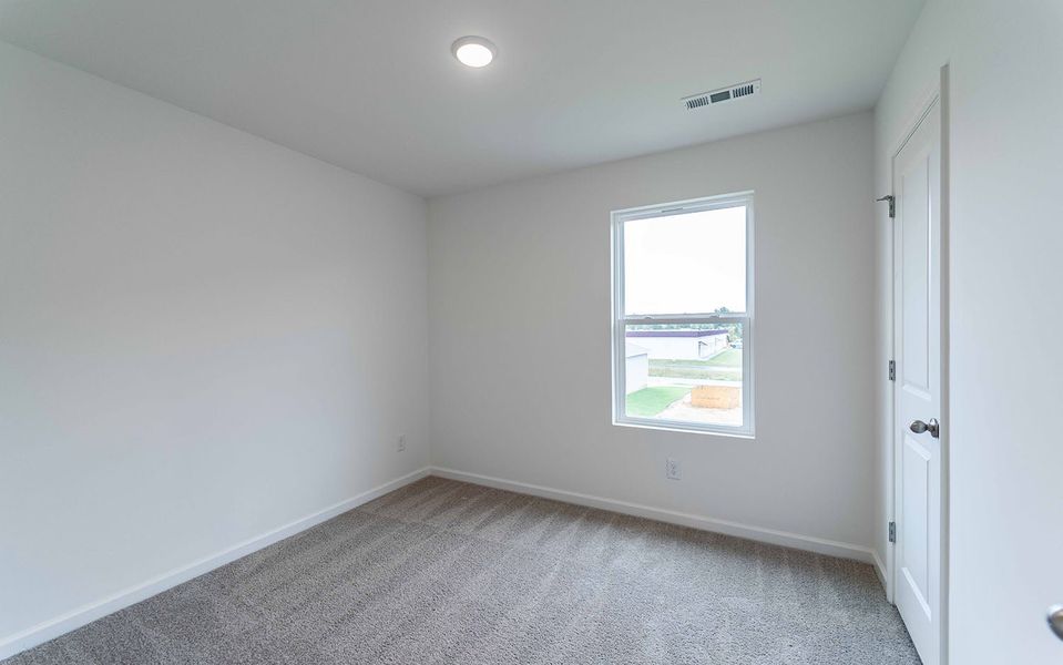 Spacious, unfurnished interior of a new home in Stonehenge, Manchester (Image 37).